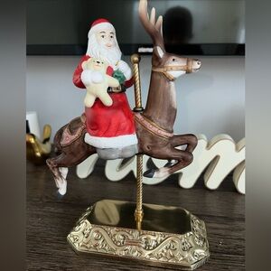 Vintage porcelain Santa Claus on Carousel Reindeer brass base 9” tall
